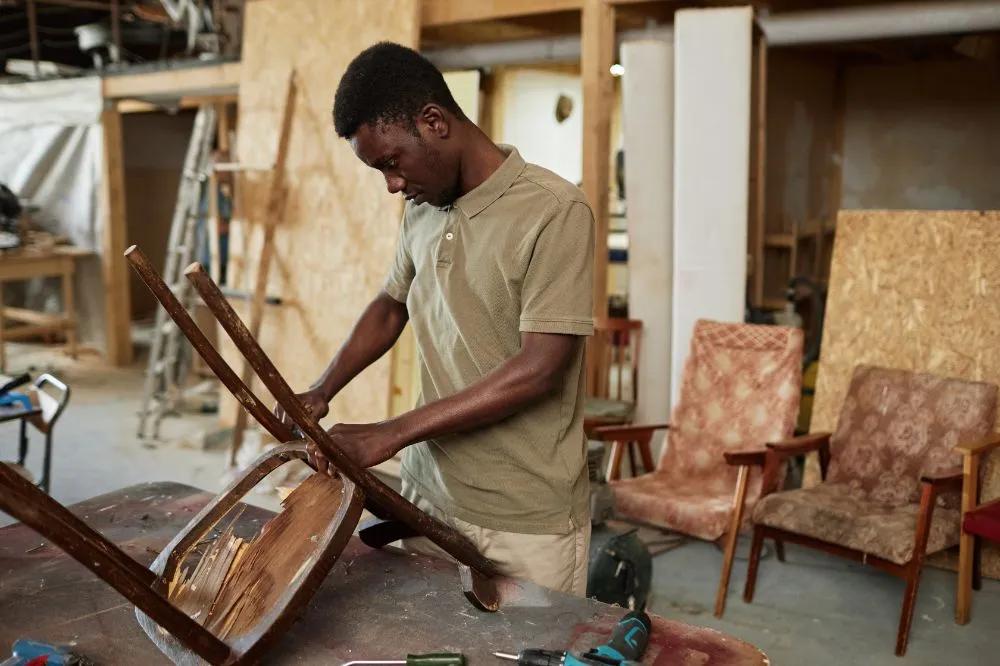carpenter restoring furniture